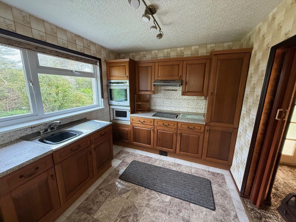 Lot: 115 - BUNGALOW FOR RENOVATION - kitchen with tiled floor to the rear of the property